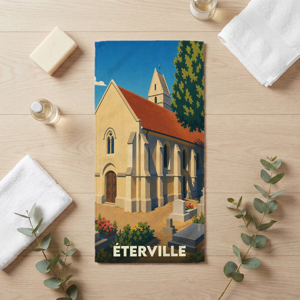 Serviette de bain souvenir de la ville d'Éterville avec une illustration stylisée de son église et de son cimetière.