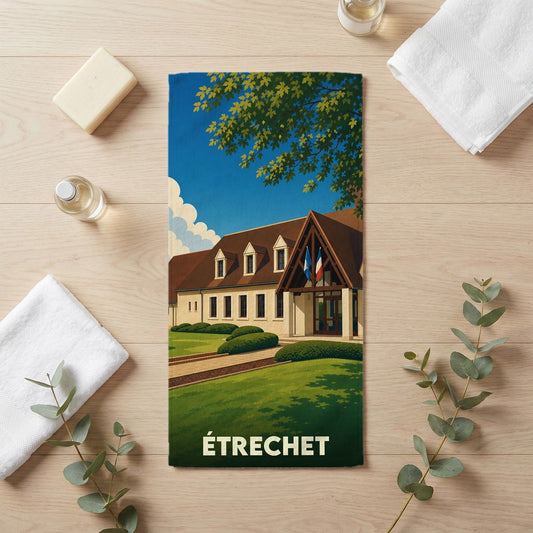 Serviette de bain souvenir de la ville d'Étrechet avec une illustration stylisée.
