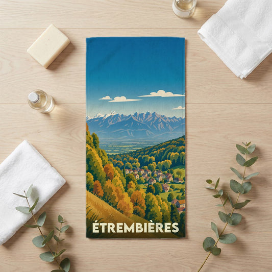 Serviette de bain souvenir de la ville d'Étrembières avec une illustration de paysage de montagne.