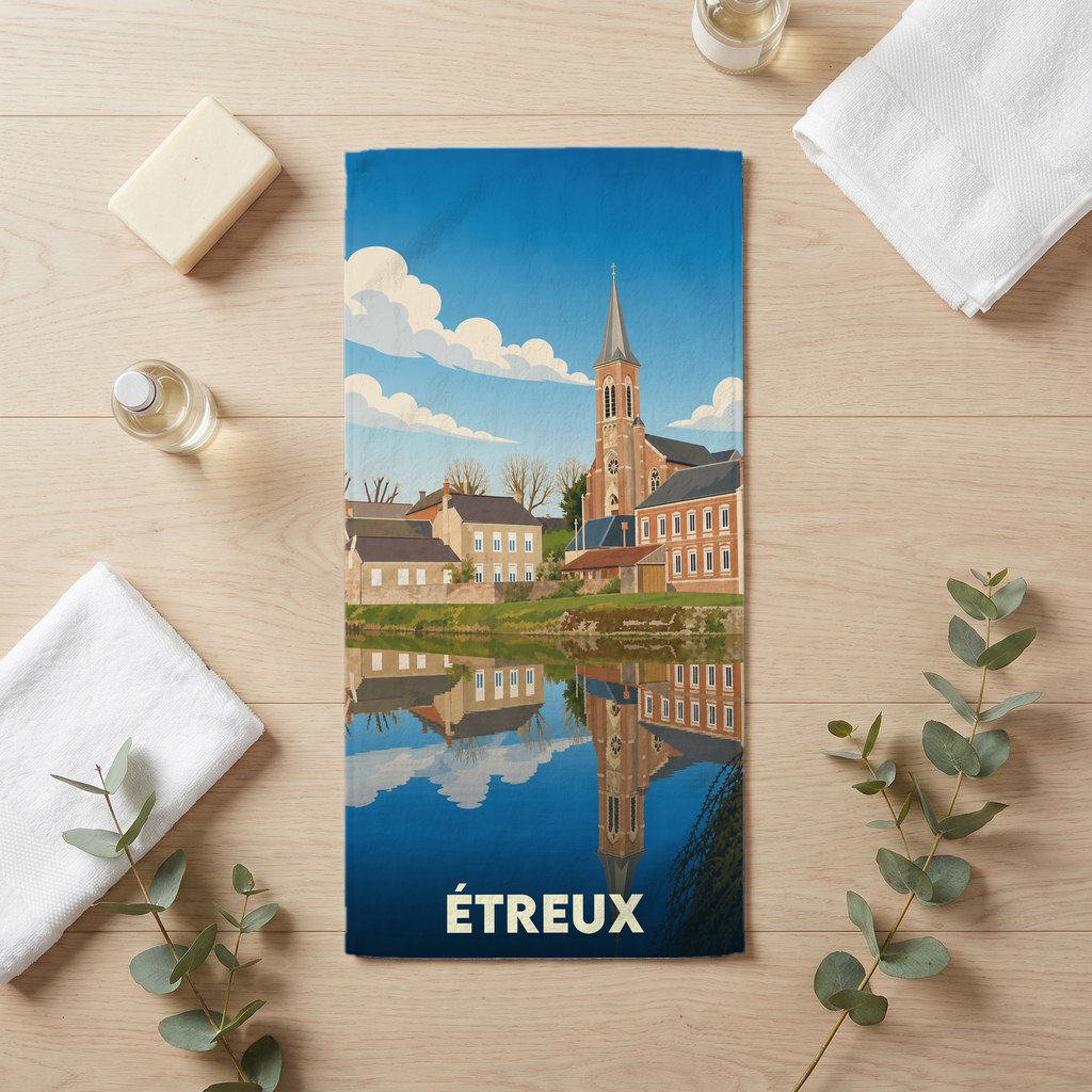Serviette de bain souvenir de la ville d'Étreux avec une illustration stylisée.