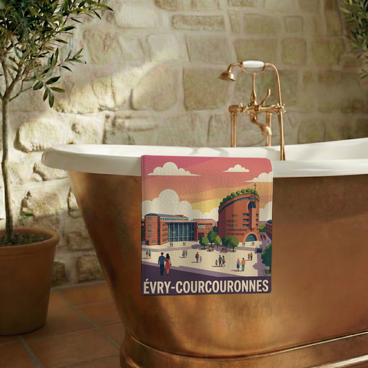 Serviette de bain souvenir de la ville d'Évry-Courcouronnes avec une illustration stylisée de son architecture.