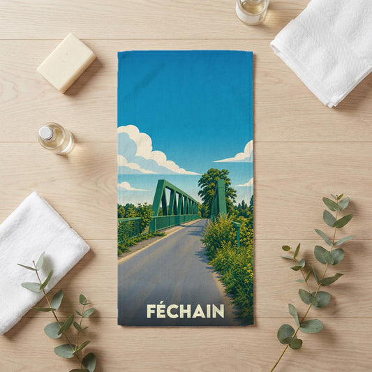 Serviette de bain souvenir de la ville de Féchain avec une illustration stylisée d'un pont vert.