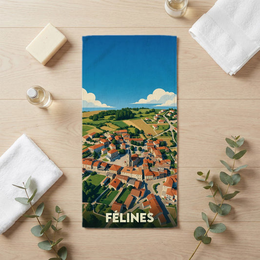 Serviette de bain souvenir de la ville de Félines avec une illustration panoramique stylisée.