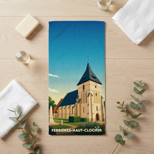 Serviette de bain souvenir de la ville de Ferrières-Haut-Clocher avec une illustration stylisée de son église.