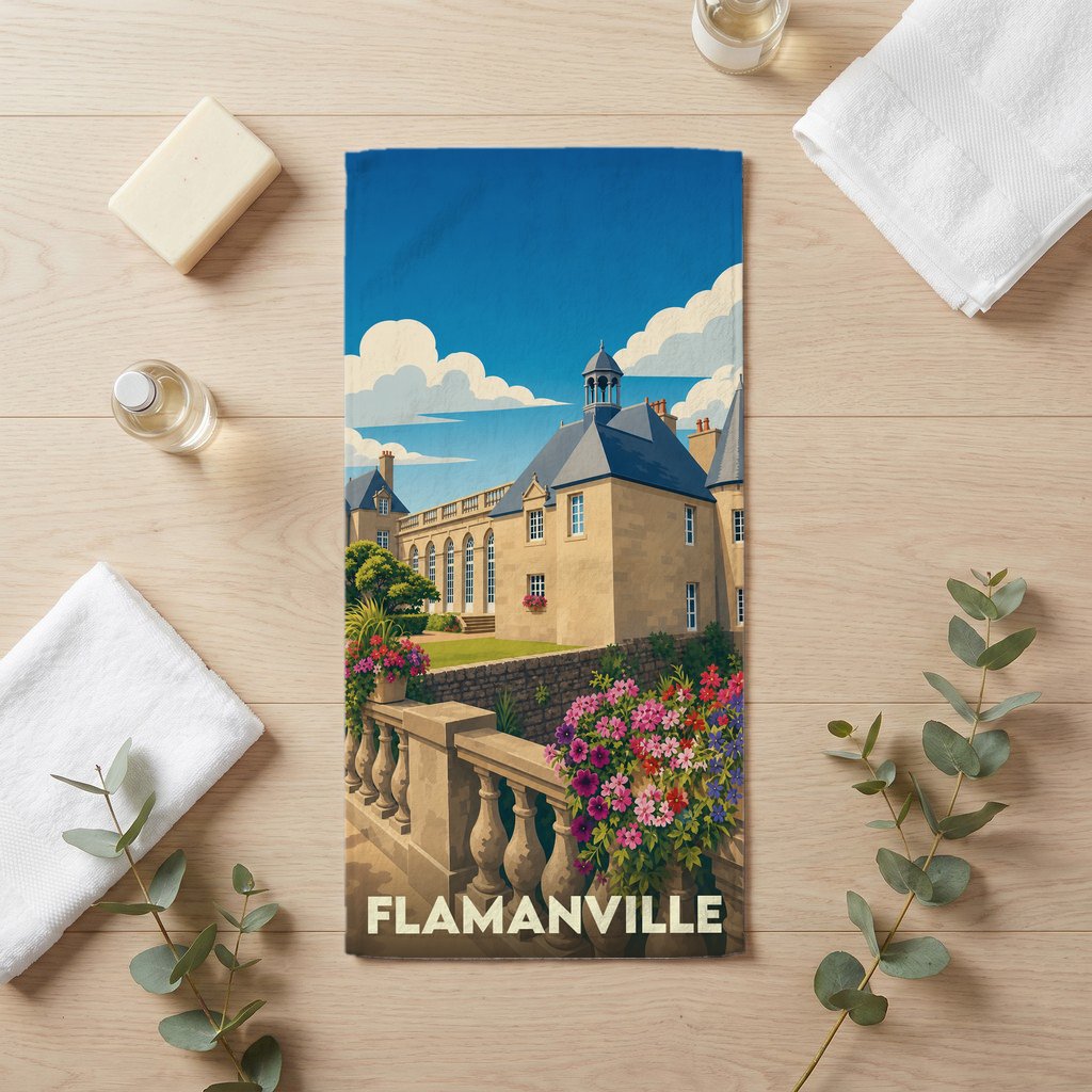 Serviette de bain souvenir de la ville de Flamanville avec une illustration stylisée de son château.