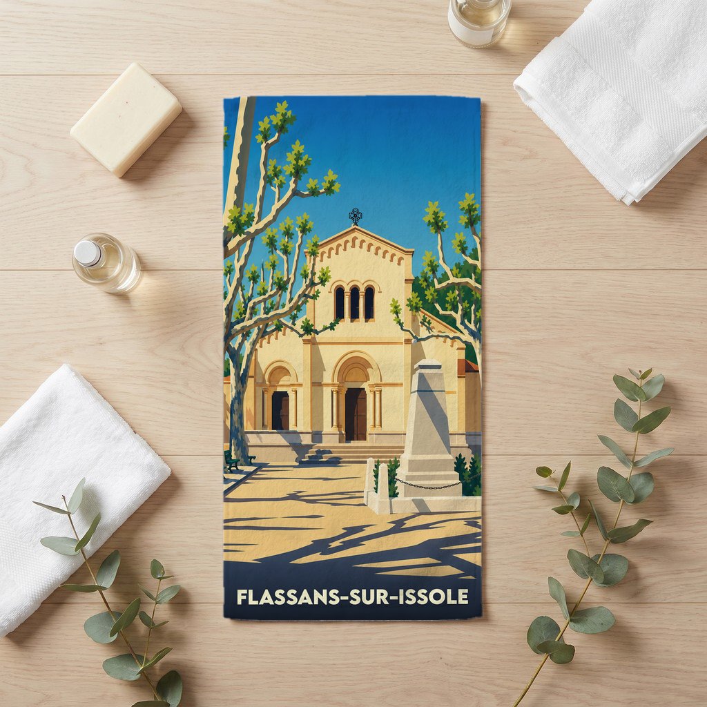 Serviette de bain souvenir de la ville de Flassans-sur-Issole avec une illustration stylisée.