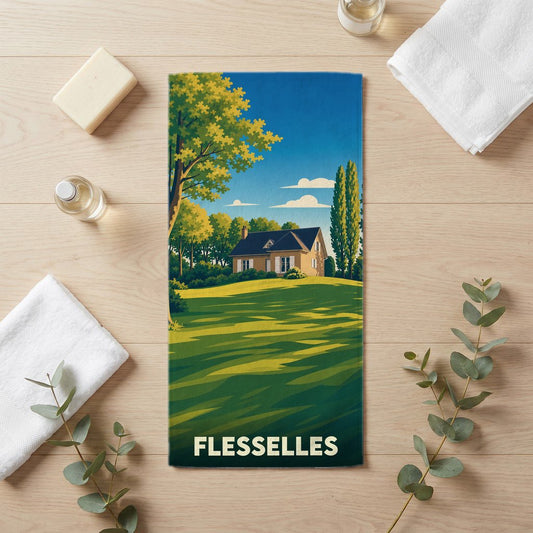 Serviette de bain souvenir de la ville de Flesselles avec une illustration stylisée d'un paysage champêtre.