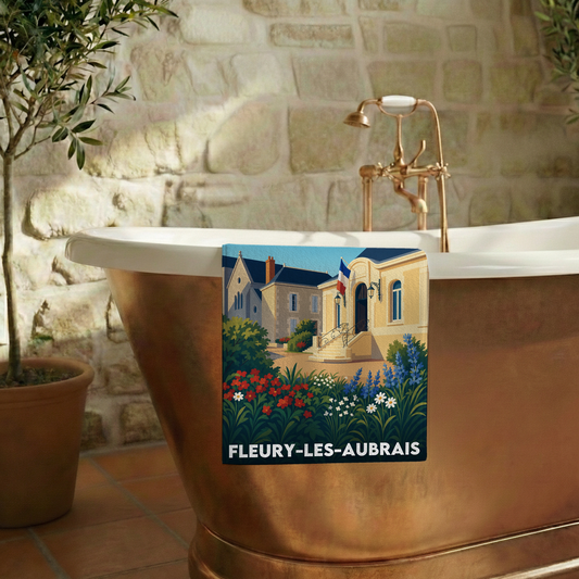 Serviette de bain souvenir de la ville de Fleury-les-Aubrais avec une illustration stylisée.