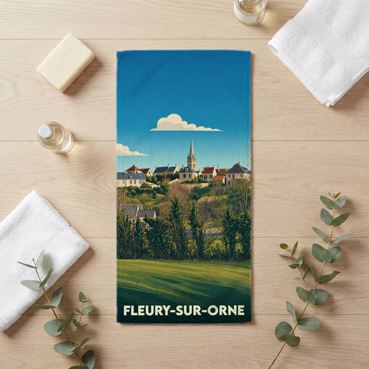 Serviette de bain souvenir de la ville de Fleury-sur-Orne avec une illustration stylisée.