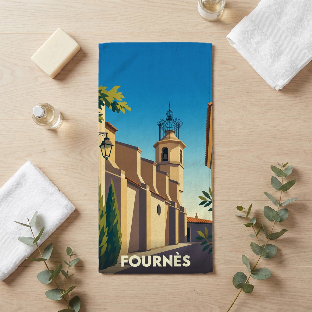 Serviette de bain souvenir de la ville de Fournès avec une illustration stylisée de son église.