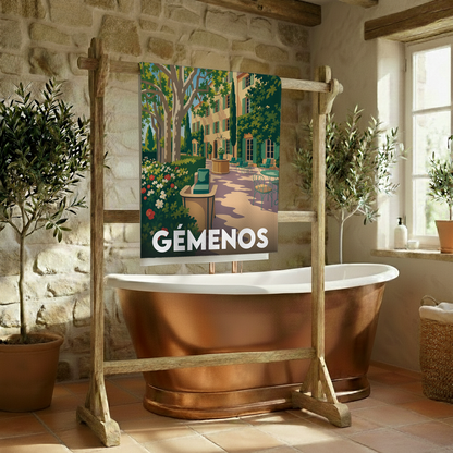 Serviette de bain souvenir de la ville de Gémenos avec une illustration stylisée.