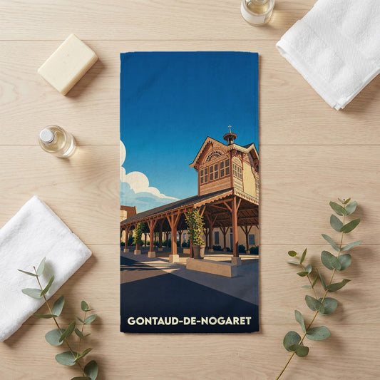Serviette de bain souvenir de la ville de Gontaud-de-Nogaret avec une illustration stylisée de sa halle historique.