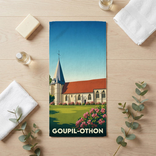 Serviette de bain souvenir de la ville de Goupil-Othon avec une illustration stylisée d'une église.