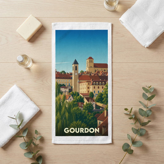Serviette de bain souvenir de la ville de Gourdon avec une illustration stylisée.