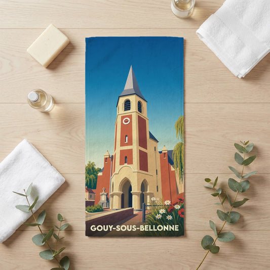 Serviette de bain souvenir de la ville de Gouy-sous-Bellonne avec une illustration stylisée de son église.