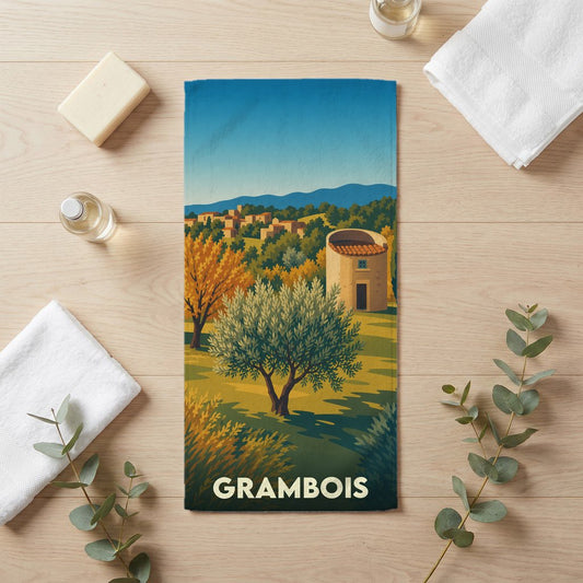 Serviette de bain souvenir de la ville de Grambois avec une illustration de paysage provençal.