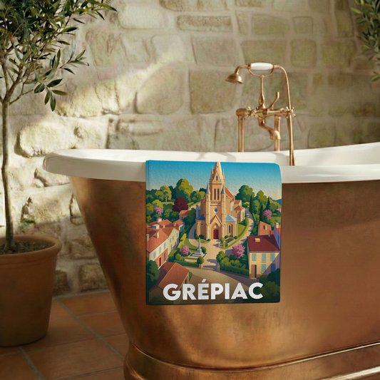Serviette de bain souvenir de la ville de Grépiac avec une illustration stylisée.