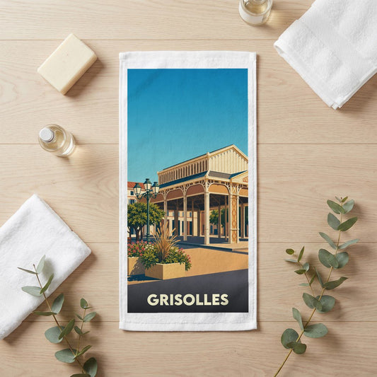 Serviette de bain souvenir de la ville de Grisolles avec une illustration stylisée d'une halle historique.
