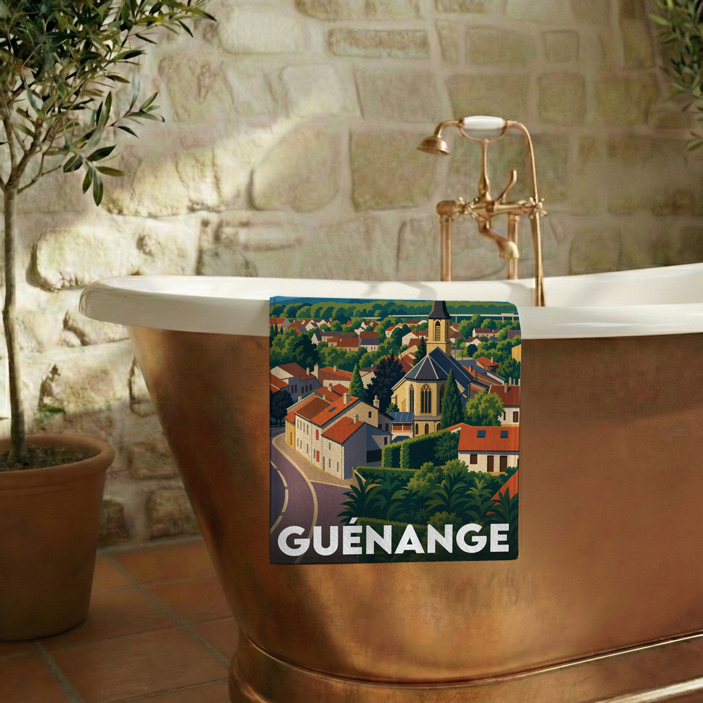 Serviette de bain souvenir de la ville de Guénange avec une illustration stylisée.