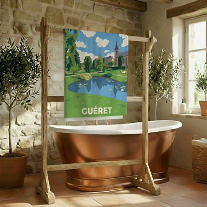 Serviette de bain souvenir de la ville de Guéret avec une illustration stylisée.