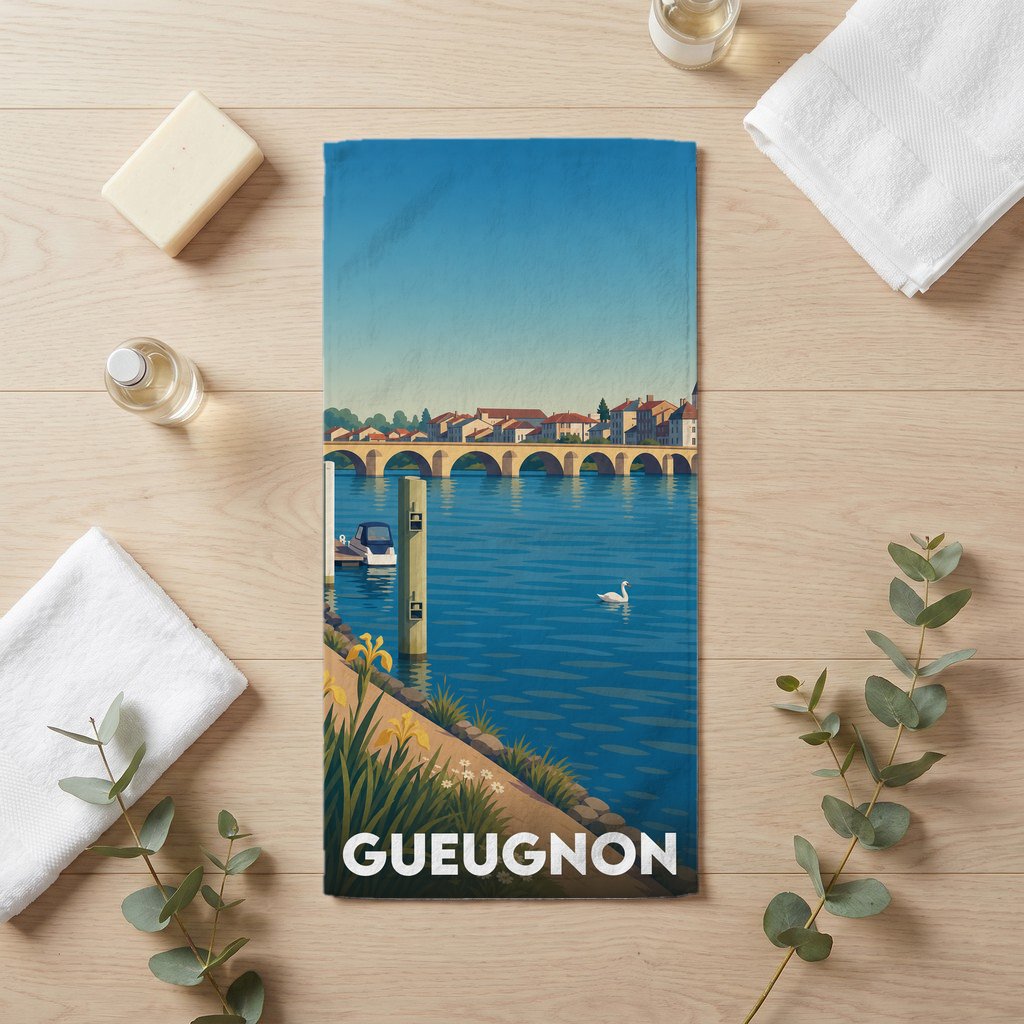 Serviette de bain souvenir de la ville de Gueugnon avec une illustration stylisée des bords de l'Arroux.