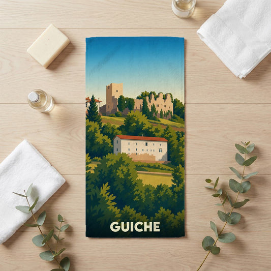 Serviette de bain souvenir de la ville de Guiche avec une illustration stylisée de son château et de son paysage.