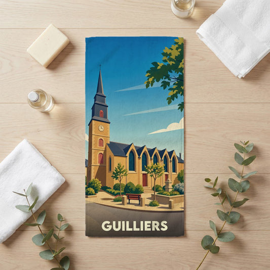 Serviette de bain souvenir de la ville de Guilliers avec une illustration stylisée de son église.