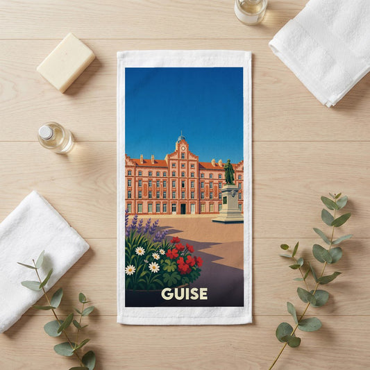 Serviette de bain souvenir de la ville de Guise avec une illustration stylisée du Familistère.