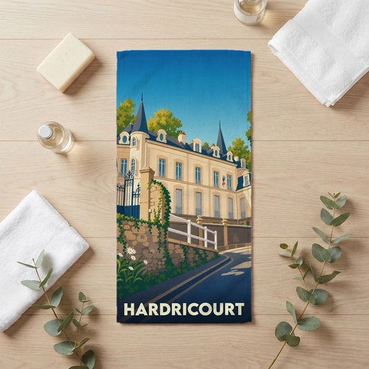 Serviette de bain souvenir de la ville de Hardricourt illustrée d'un château de style classique.