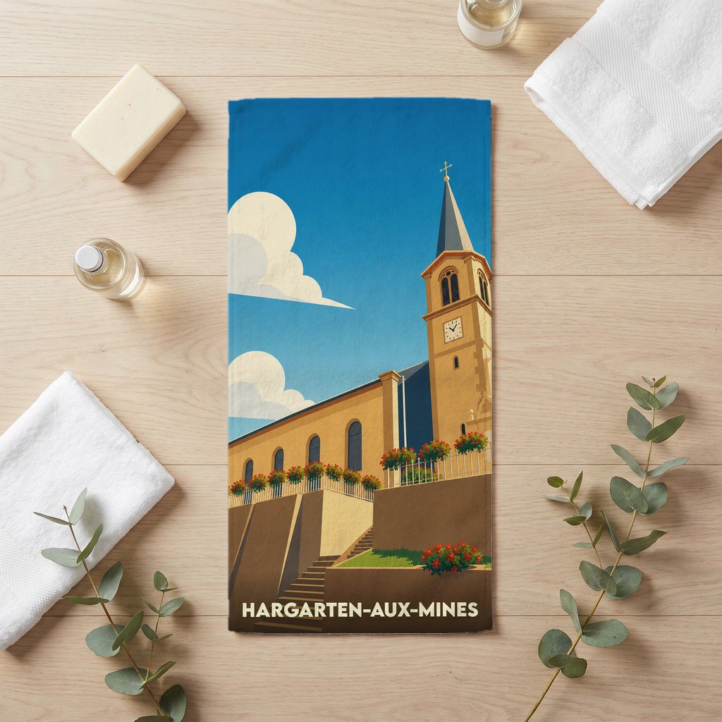 Serviette de bain souvenir de Hargarten-aux-Mines ornée d'une illustration stylisée de l'église locale.