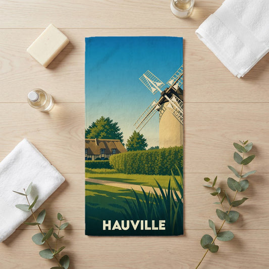 Serviette de bain souvenir de la ville de Hauville avec une illustration stylisée d'un moulin à vent.