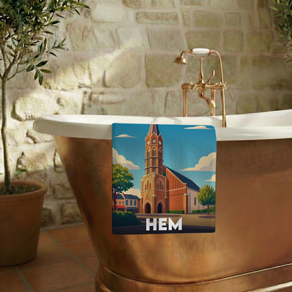 Serviette de bain souvenir de la ville de Hem avec une illustration stylisée de son église.