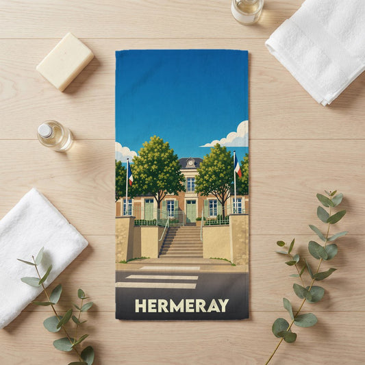 Serviette de bain souvenir de la ville de Hermeray avec une illustration stylisée de sa mairie.