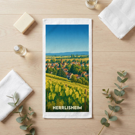 Serviette souvenir de la ville de Herrlisheim avec une illustration stylisée de vignobles.