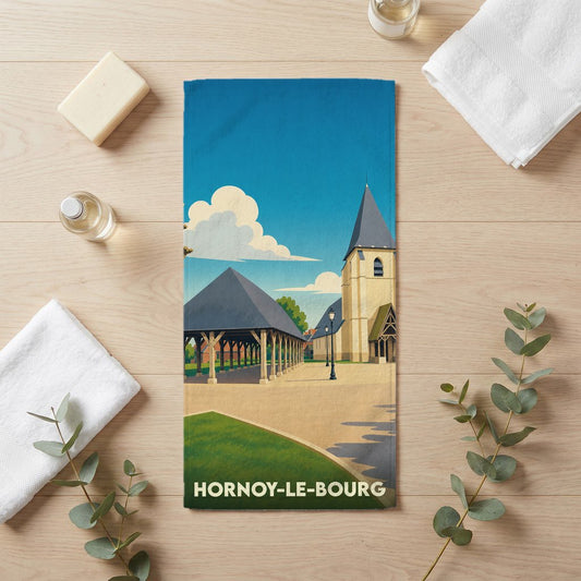 Serviette de bain souvenir de la ville de Hornoy-le-Bourg avec une illustration stylisée de son église et de sa halle.