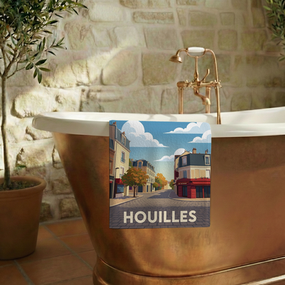 Serviette de bain souvenir de la ville de Houilles avec une illustration stylisée d'une rue pavée.