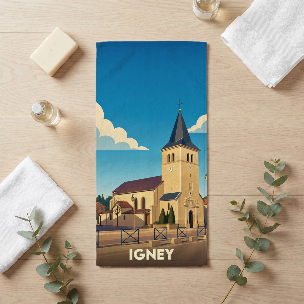 Serviette de bain souvenir de la ville d'Igney avec une illustration stylisée de son église.