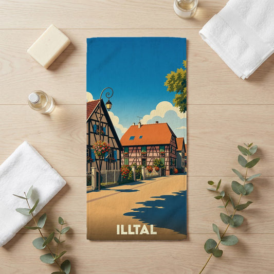 Serviette de bain souvenir de la ville de Illtal avec une illustration stylisée de maisons à colombages.