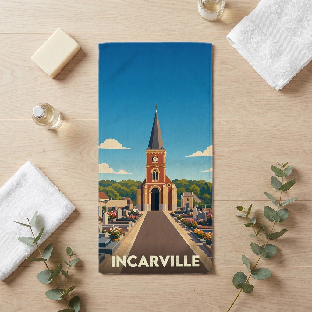 Serviette de bain souvenir de la ville d'Incarville avec une illustration stylisée de son église et de son cimetière.