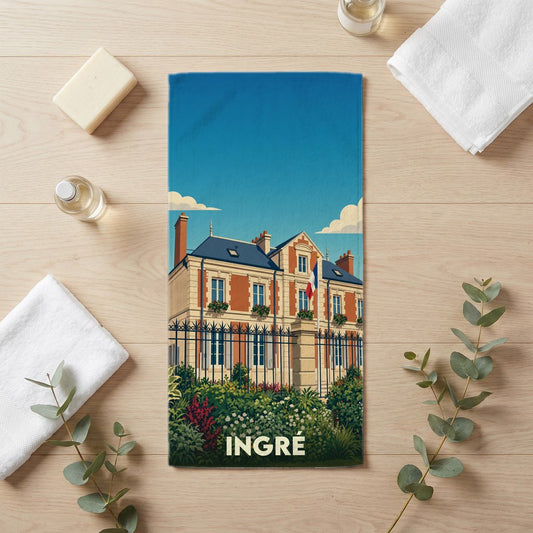 Serviette de bain souvenir de la ville d'Ingré avec une illustration stylisée de l'hôtel de ville.