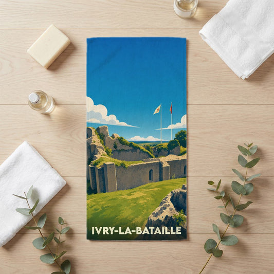 Serviette de bain souvenir de la ville de Ivry-la-Bataille avec une illustration stylisée de son château médiéval.