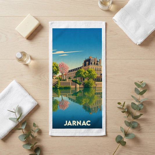 Serviette de bain souvenir de la ville de Jarnac avec une illustration stylisée.