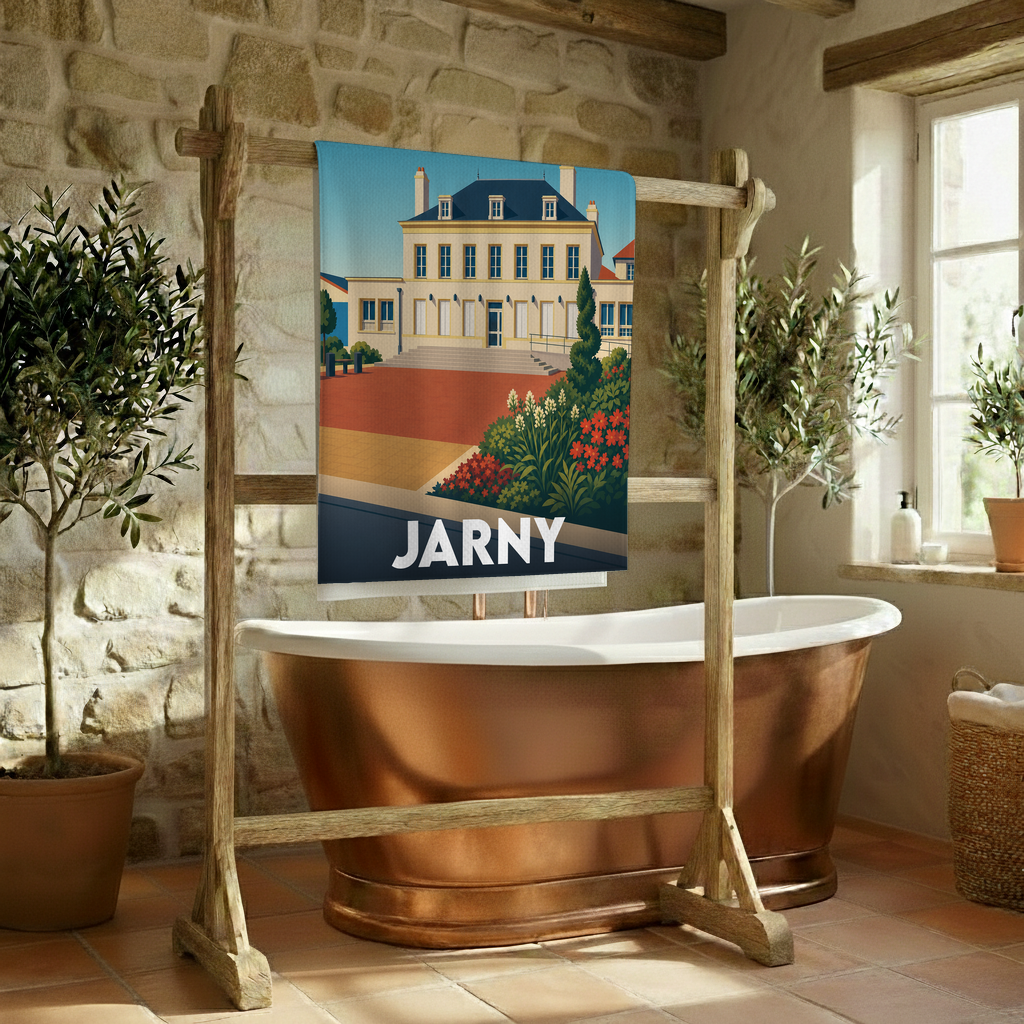 Serviette de bain souvenir de la ville de Jarny avec une illustration stylisée d'un bâtiment historique.