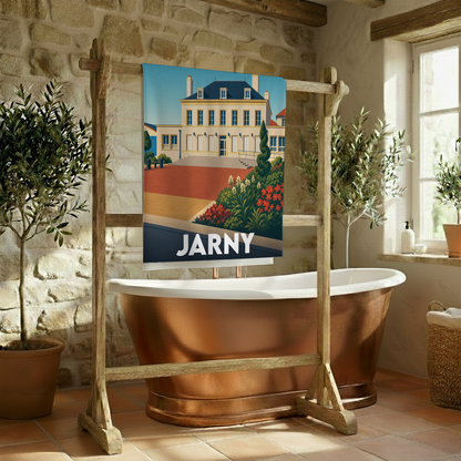 Serviette de bain souvenir de la ville de Jarny avec une illustration stylisée d'un bâtiment historique.
