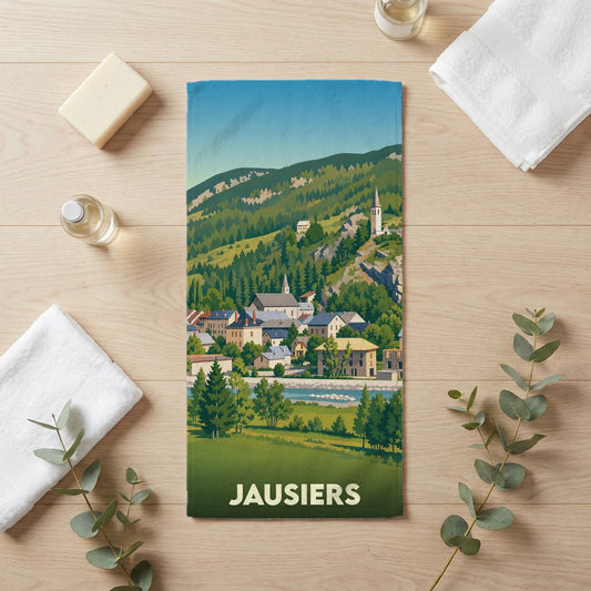 Serviette de bain souvenir de la ville de Jausiers ornée d'une illustration stylisée de ses paysages montagneux.