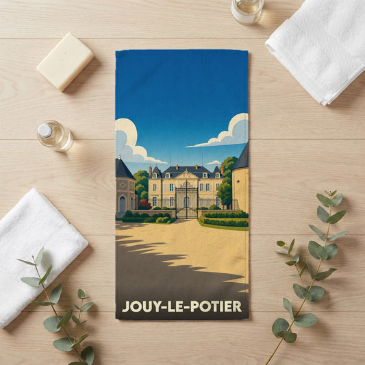 Serviette de bain souvenir de la ville de Jouy-le-Potier avec une illustration stylisée d'un château.
