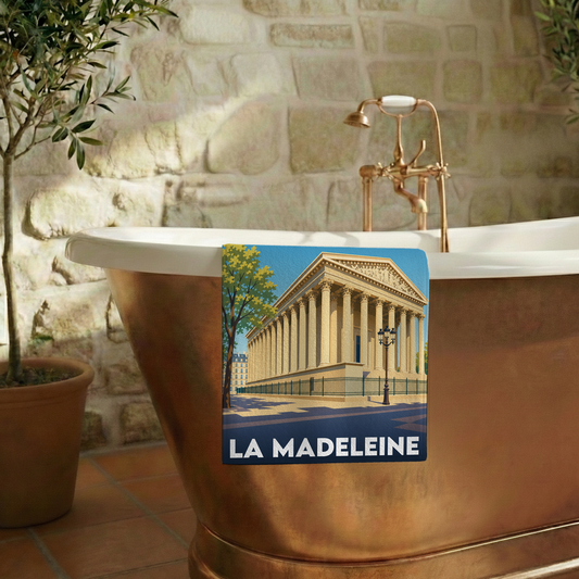 Serviette de bain souvenir de la ville de La Madeleine avec une illustration stylisée.