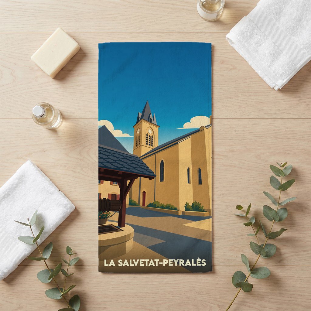 Serviette de bain souvenir de la ville de La Salvetat-Peyralès avec une illustration stylisée de son église et d'un puits.