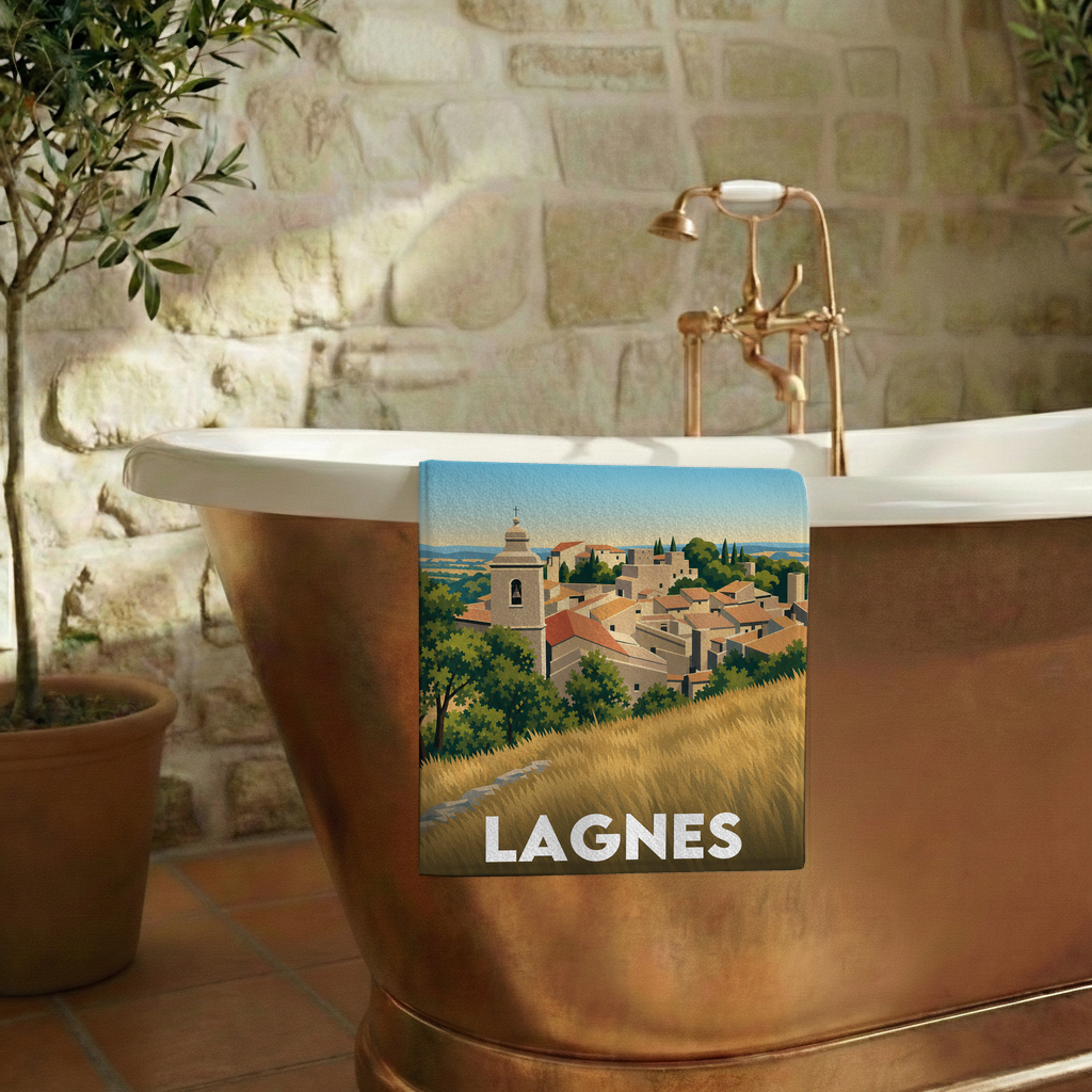 Serviette de bain souvenir de la ville de Lagnes avec une illustration stylisée.
