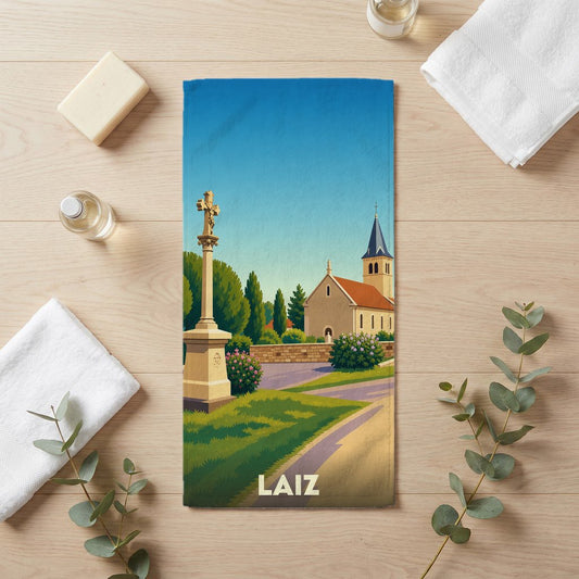 Serviette de bain souvenir de la ville de Laiz avec une illustration stylisée.